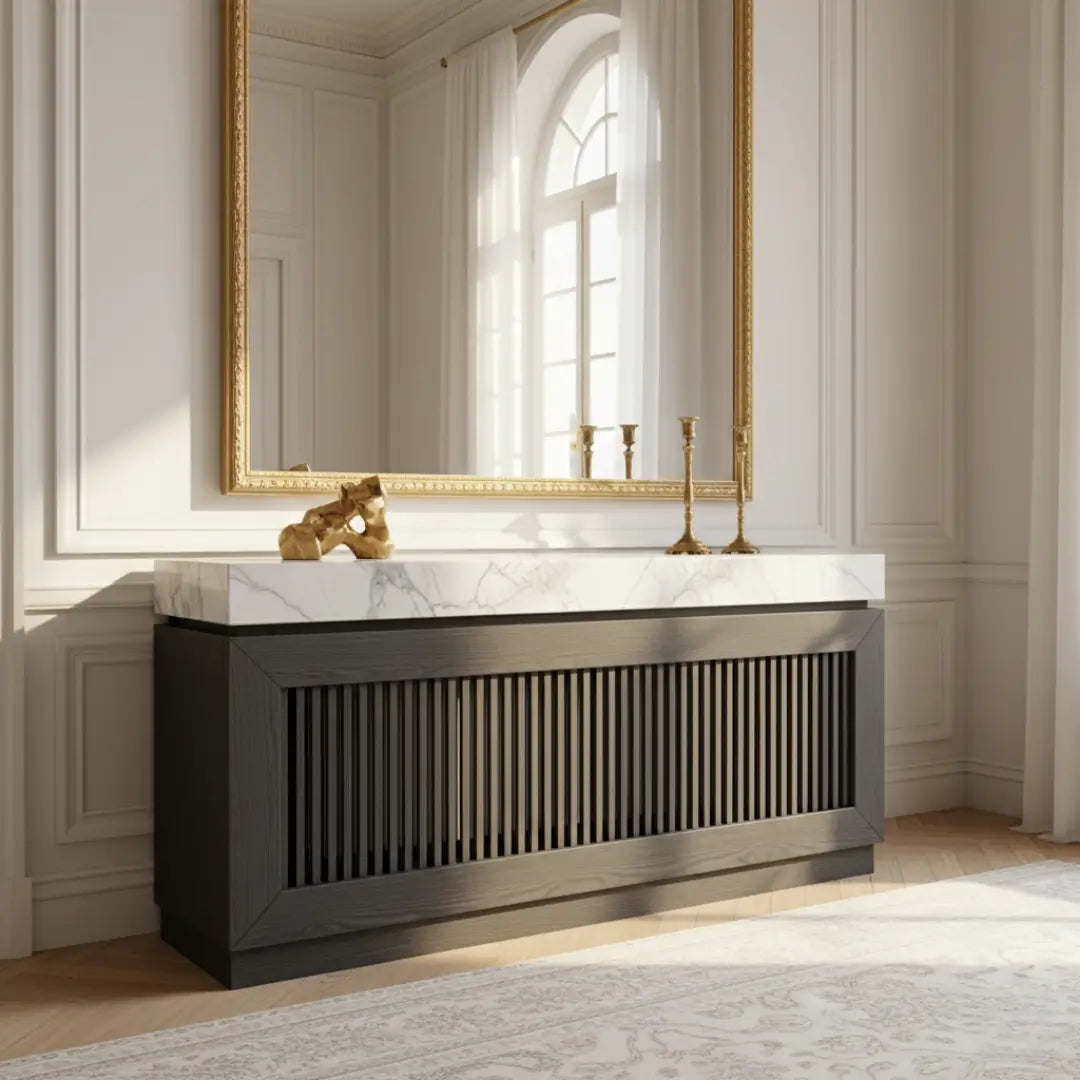 Bathroom vanity with marble countertop and decorative items in a classic setting